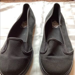 Vans unique black slip ons . W 7.5.